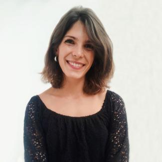 Inmaculada Gutiérrez García-Pardo smiles with a black sweater against a white background